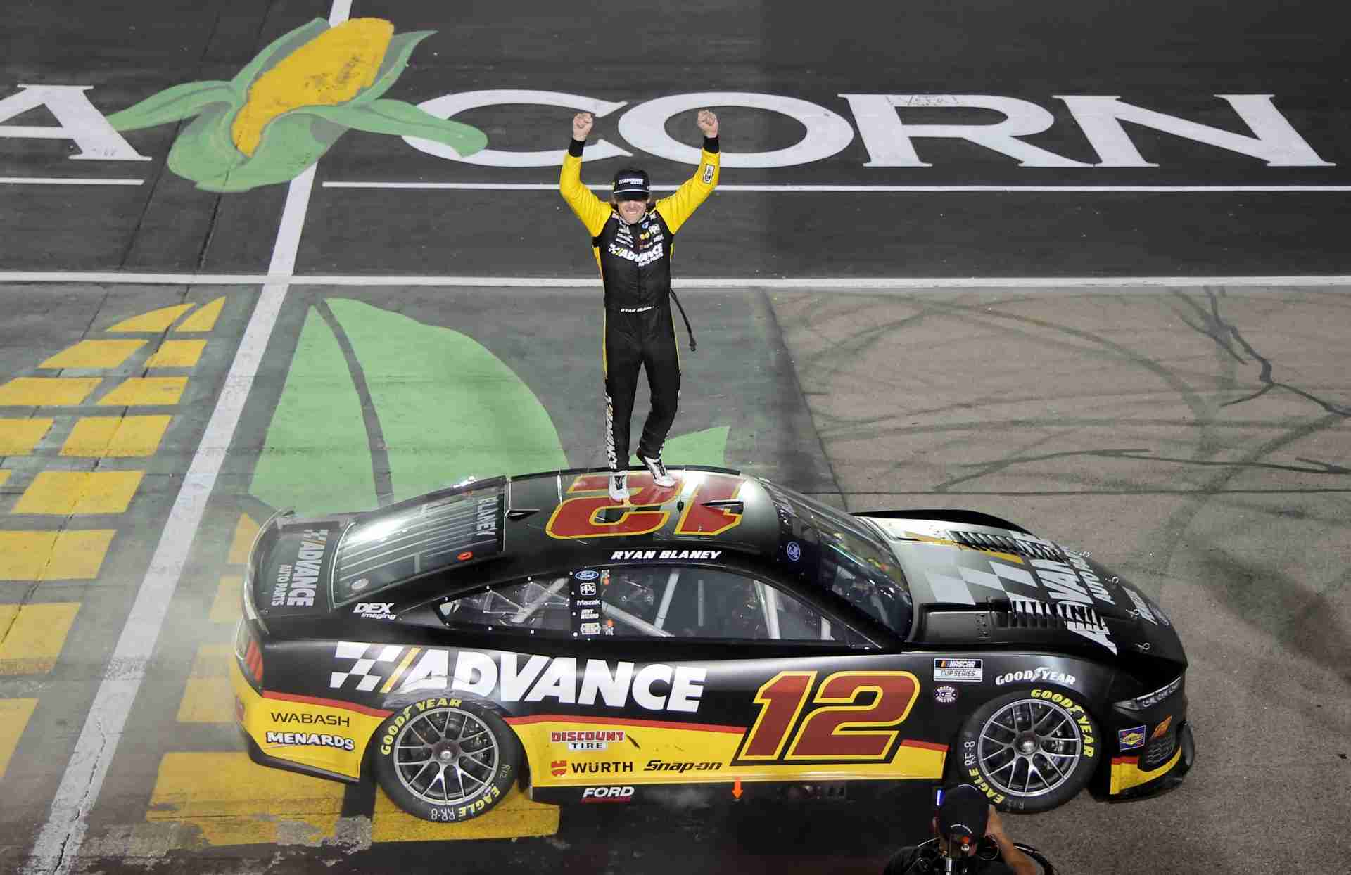 Ryan Blaney, driver of the #12 Advance Auto Parts Ford, celebrates after winning the 2024 NASCAR Cup Series Iowa Corn 350 at Iowa Speedway | NASCAR